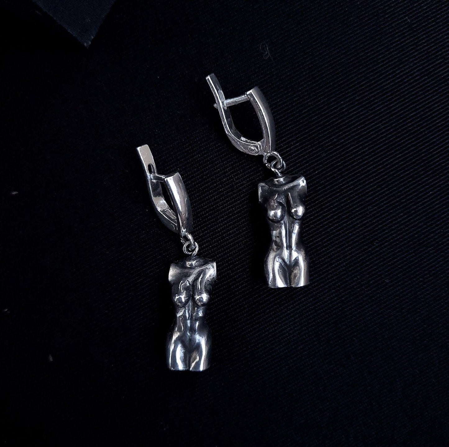 woman body earring silver