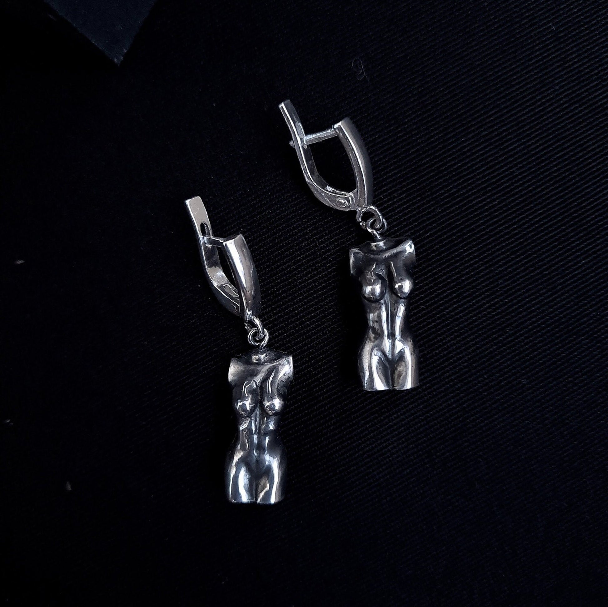 woman body earring silver