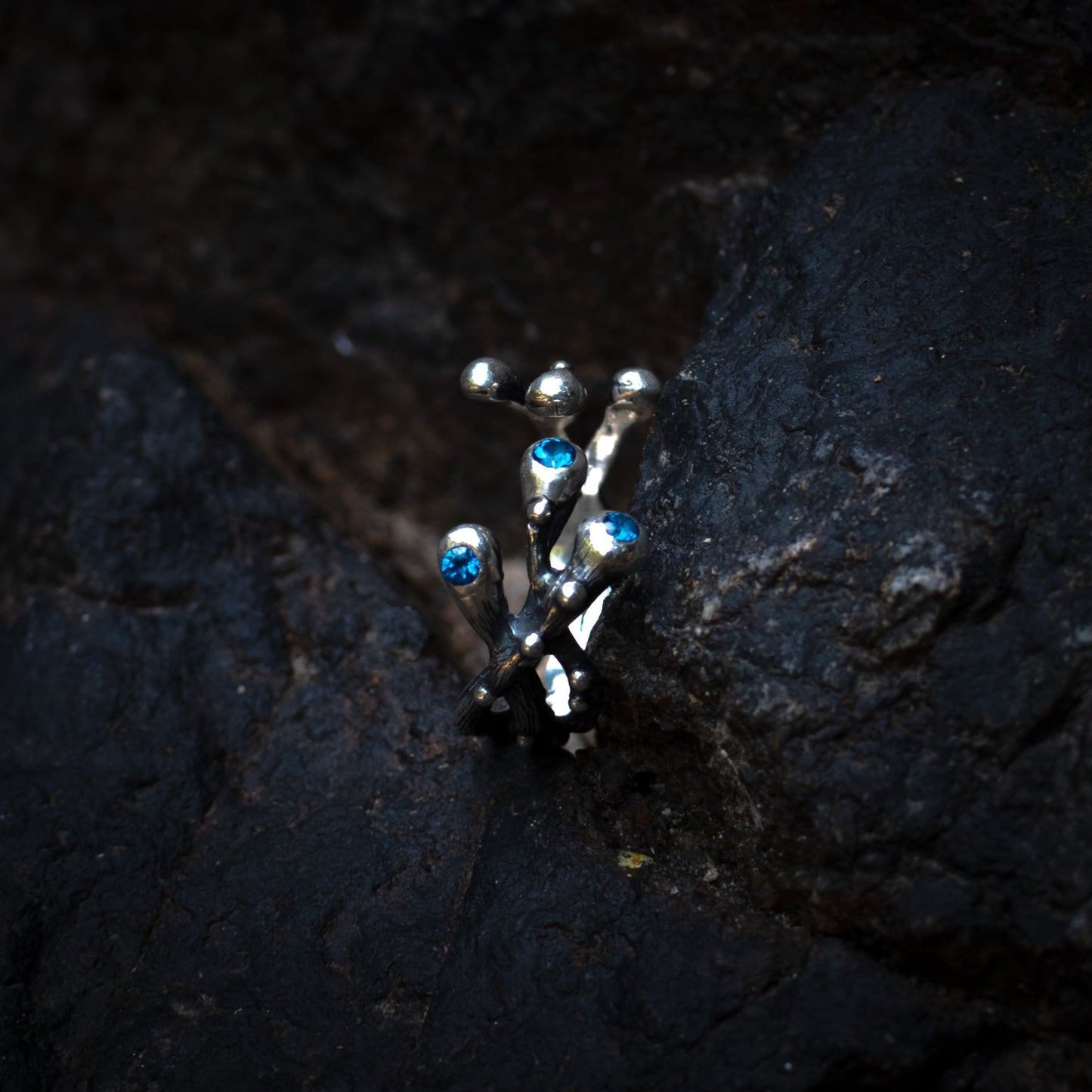 three-stone silver ring with sapphires