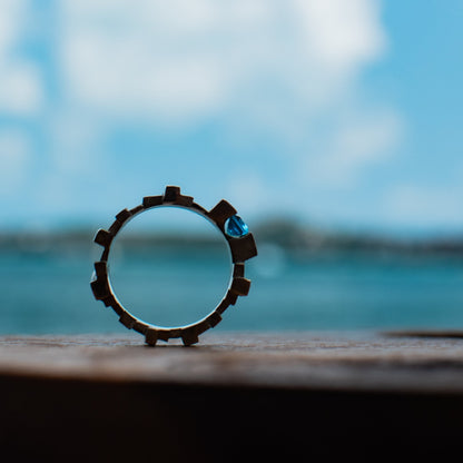 Unique silver ring with blue topaz