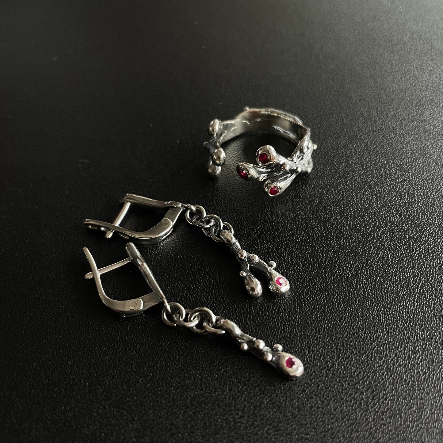 silver jewelry set with natural rubies