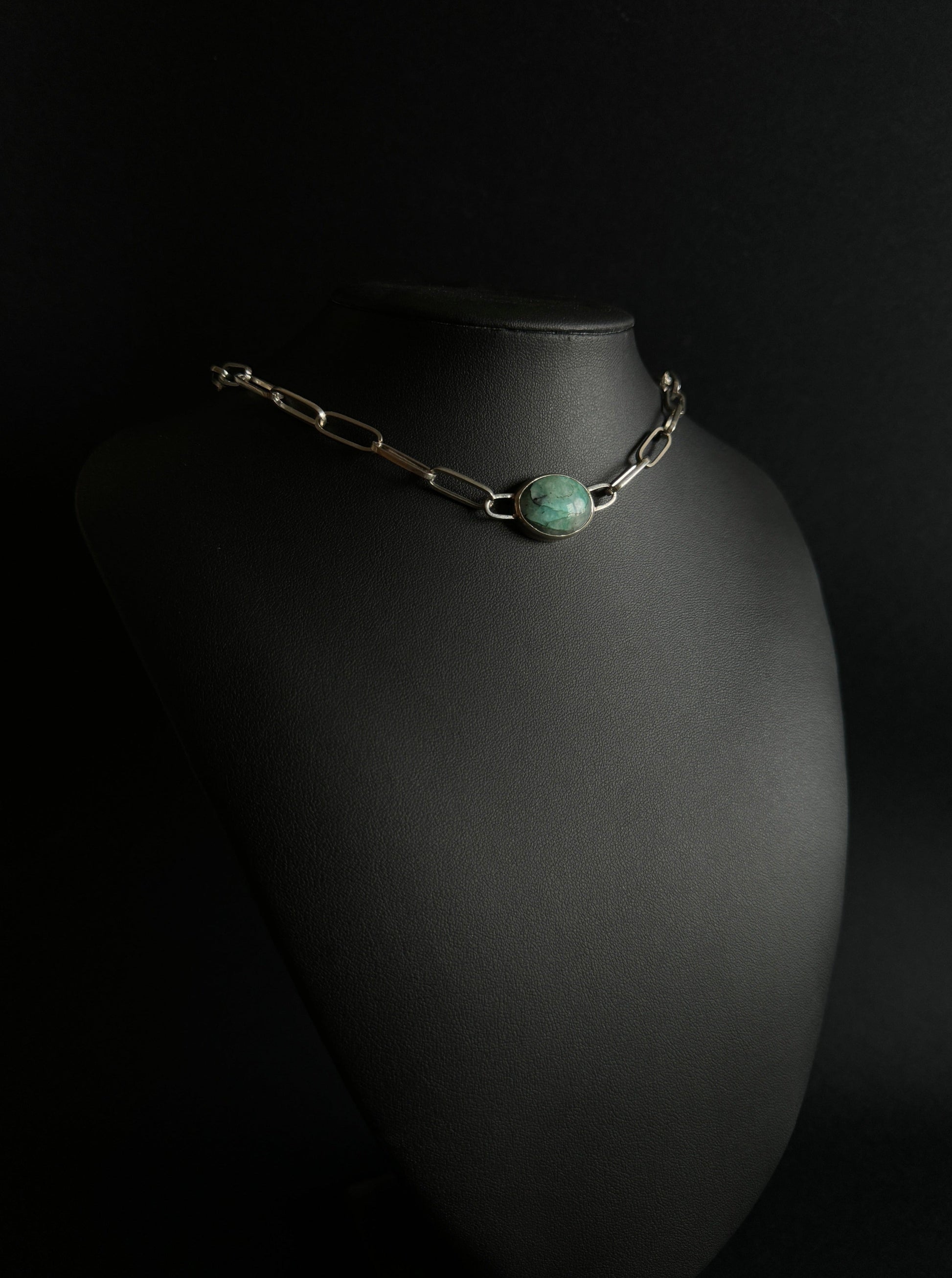 Silver chain with emerald pendant