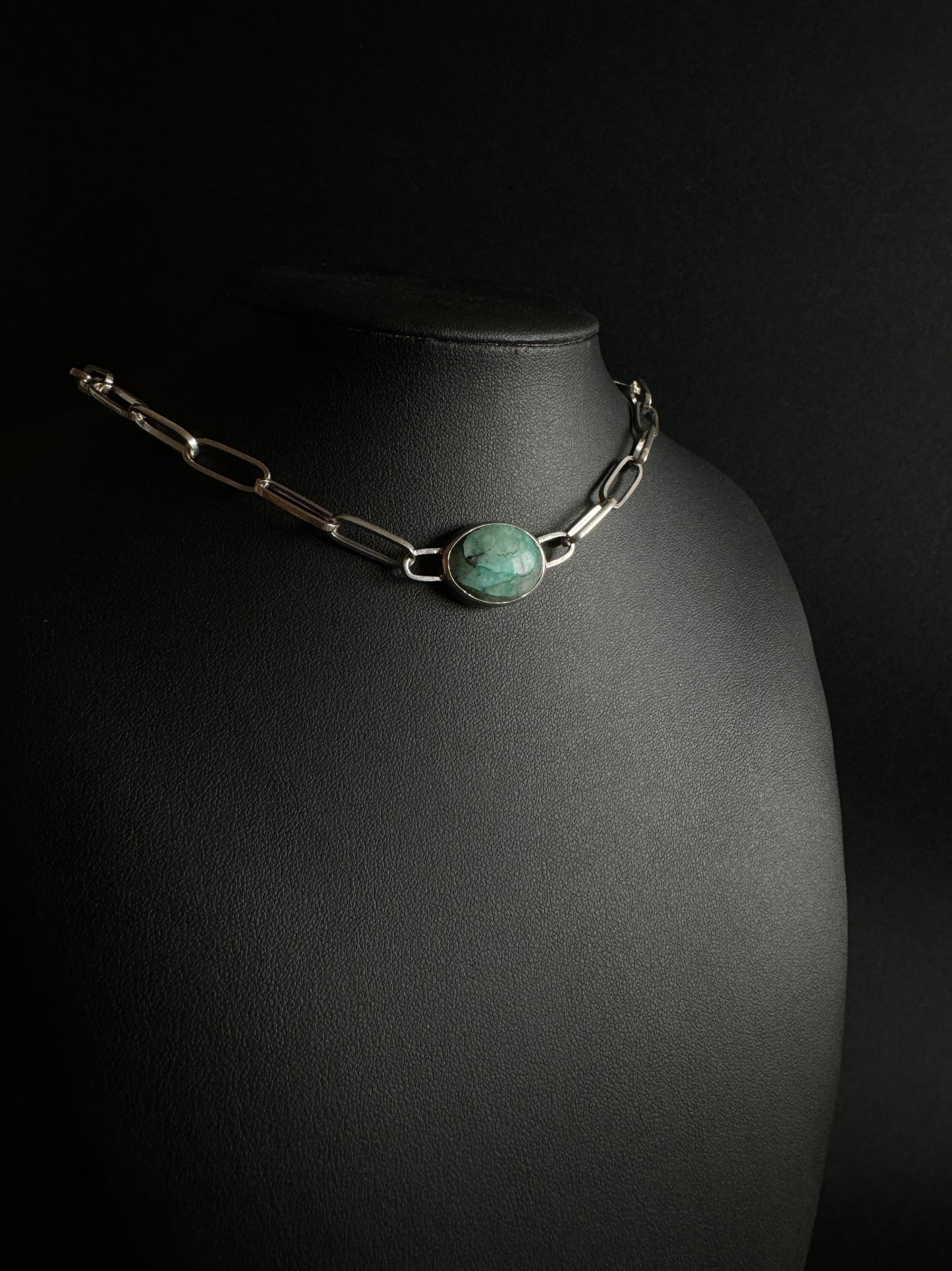 Silver chain with green stone