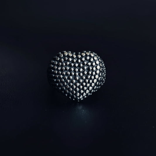 heart shaped rivet 
solid silver ring 