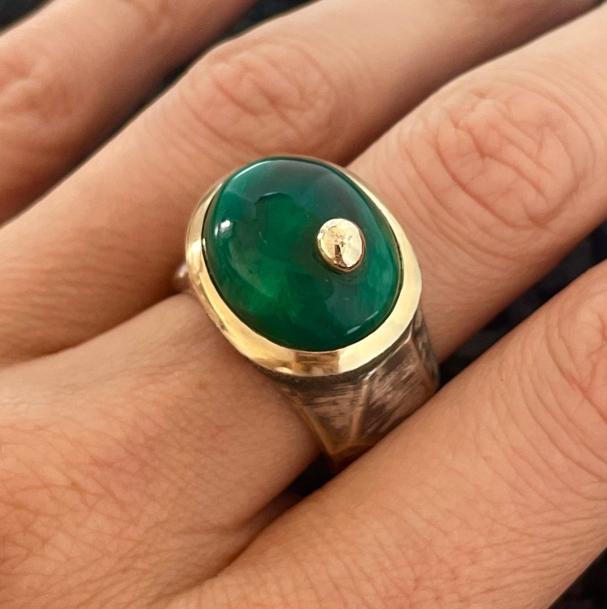 Green stone ring made in silver